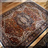 D13. Karastan rug. Measures approx. 4' x 6' 